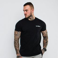 Koszulka męska fitness regular czarna Basic. Czarne koszulki sportowe męskie GYMBEAM, m, bez wzorów, z bawełny, bez kołnierzyka, bez ramiączek, na fitness i siłownię. Za 42.90 zł.