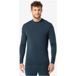 Koszulka termoaktywna z długim rękawem męska SUPER.NATURAL Tundra 175 LS. Czarne koszulki sportowe męskie super.natural, m, bez wzorów, z materiału, bez kołnierzyka, bez ramiączek, wspinaczkowe. Za 329.99 zł.