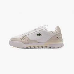 Buty Sportowe Damskie Lacoste Slam Break 226 2 Sfa. Białe obuwie sportowe damskie Lacoste, bez wzorów, z dresówki, trekkingowe. Za 490.20 zł.