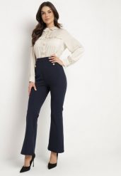 Granatowo-Beżowy Elegancki Kombinezon z Koszulową Górą z Wiązaniem i Ozdobnymi Guzikami Noriti. Niebieskie sukienki damskie Born2be, do pracy, l, bez wzorów, biznesowe, bez kołnierzyka, bez ramiączek, koszulowe. Za 149.99 zł.