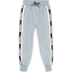 Jasnoszare Spodnie Dresowe Heated. Szare spodnie sportowe dla chłopców Born2be, z dresówki. Za 59.99 zł.