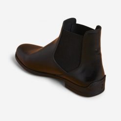 Sztyblety jeździeckie Fouganza 500 skórzane. Czarne botki męskie FOUGANZA, bez wzorów, z materiału, przed kostkę, bez zapięcia. Za 199.99 zł.
