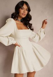 Beżowa Sukienka Gorsetowa z Rozkloszowanym Dołem i Luźnymi Rękawami Wiązana z Tyłu Enariel. Brązowe sukienki damskie Renee, na imprezę, m, bez wzorów, eleganckie, bez kołnierzyka, bez ramiączek, mini, dopasowane. Za 149.99 zł.