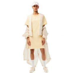 Koszulka damska Lacoste. Żółte koszulki sportowe damskie Lacoste, uniwersalny, bez wzorów, z bawełny, bez kołnierzyka, bez ramiączek. Za 397.00 zł.