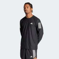 Koszulka Own the Run Long Sleeve. Niebieskie koszulki sportowe męskie Adidas, xl, bez wzorów, z materiału, bez kołnierzyka, bez ramiączek, do biegania. Za 199.00 zł.