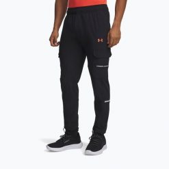 Spodnie treningowe męskie Under Armour Tech Utility Woven. Czarne buty sportowe męskie Under Armour, m, bez wzorów, na fitness i siłownię. Za 239.99 zł.