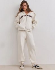 Damskie spodnie dresowe szczotkowany dżersej, średni stan Classic kremowy. Białe spodnie dresowe damskie Aim'n, xs, bez wzorów, z bawełny. Za 345.00 zł.