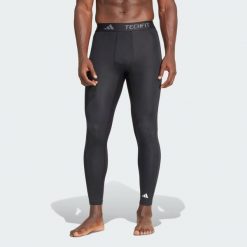 Legginsy TECHFIT Compression Training Long. Czarne legginsy sportowe męskie Adidas, l, bez wzorów, z materiału, do piłki nożnej, techfit (adidas). Za 168.65 zł.