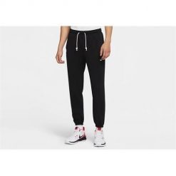 Spodnie sportowe męskie Nike Standard Issue. Brązowe spodnie sportowe męskie Nike, l, bez wzorów, z dresówki, trekkingowe. Za 362.00 zł.