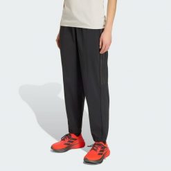 Spodnie Audi Revolut F1 Team Engineers & Marketing. Czarne spodnie materiałowe damskie Adidas, bez wzorów. Za 599.00 zł.