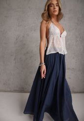 Granatowa Rozkloszowana Spódnica z Bawełny w Stylu Preppy Petrra. Niebieskie spódnice damskie Renee, bez wzorów, z bawełny, maxi, dopasowane. Za 139.99 zł.