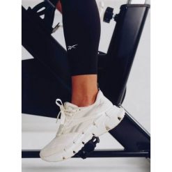 Buty do biegania Reebok. Białe obuwie sportowe damskie Reebok, bez wzorów, do biegania. Za 489.99 zł.