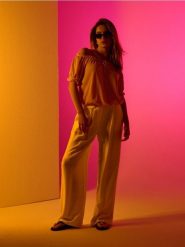 Wiskozowe spodnie wide leg - żółty. Żółte spodnie materiałowe damskie Sinsay, l, bez wzorów, z wiskozy. Za 35.99 zł.