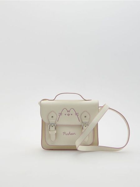 Torebka listonoszka Pusheen - kremowy. Białe torby i plecaki dziecięce Reserved, ze skóry. Za 99.99 zł.
