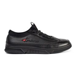 Czarne sportowe buty ocieplane. Czarne półbuty na co dzień męskie ze skóry ekologicznej, sportowe, z okrągłym noskiem, bez zapięcia. Za 212.22 zł.