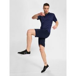 Szorty Hummel Cima XK. Niebieskie krótkie spodenki sportowe męskie Hummel, s, bez wzorów, do piłki nożnej. Za 191.30 zł.