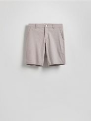 Szorty carrot fit - mahoniowy. Brązowe szorty męskie Reserved, l, bez wzorów, z bawełny. Za 119.99 zł.