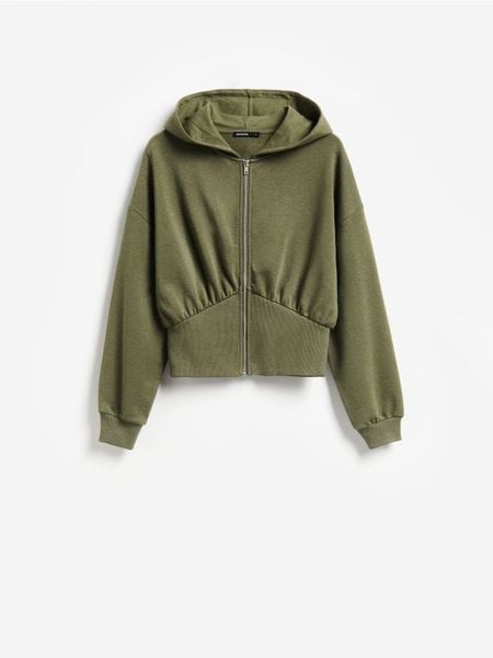 Rozpinana bluza z kapturem - ciemnozielony. Zielone bluzy damskie Reserved, l, bez wzorów, z bawełny, z kapturem. Za 129.99 zł.