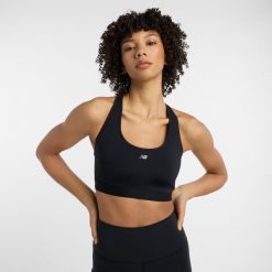 Biustonosz New Balance WB51032BK – czarny. Czarne biustonosze New Balance, bez wzorów, z materiału. Za 249.99 zł.