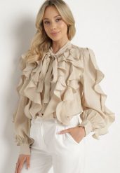 Beżowa Koszula z Wiskozą o Luźnym Kroju z Falbanami i Wiązaniem Ravionel. Brązowe bluzki damskie Born2be, m, bez wzorów, z wiskozy, eleganckie, bez kołnierzyka, bez ramiączek. Za 169.99 zł.