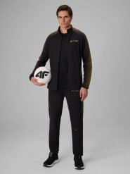 4F Spodnie treningowe szybkoschnące męskie 4F x Robert Lewandowski - czarne M. Czarne spodnie sportowe męskie 4f, m, bez wzorów, z dresówki, na fitness i siłownię. Za 229.99 zł.