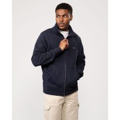 Bluza zapinana na zamek błyskawiczny Gant Shield. Niebieskie bluzy męskie GANT, na jesień, xl, z aplikacjami, z bawełny, bez kaptura. Za 540.00 zł.
