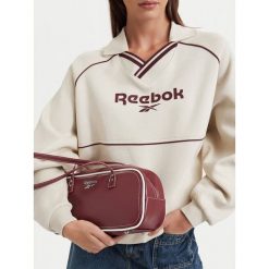 Torebka Reebok. Czerwone torebki do ręki damskie Reebok, bez wzorów, bez dodatków. Za 149.99 zł.