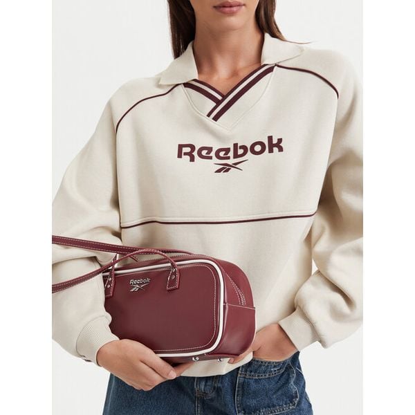 Torebka Reebok. Czerwone torebki do ręki damskie Reebok, bez wzorów, bez dodatków. Za 149.99 zł.