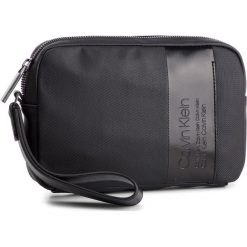 Saszetka CALVIN KLEIN - Elevated Compact Case K50K504448 001. Saszetki męskie marki Calvin Klein. Za 299.00 zł.