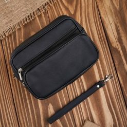 Saszetka męska skórzana do ręki klasyczna czarna mała Abruzzo ABR-09. Czarne saszetki męskie ze skóry, klasyczne, małe. Za 99.99 zł.