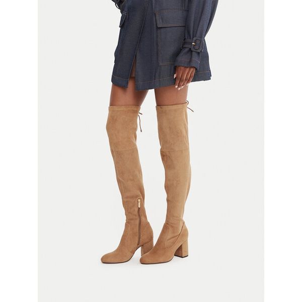 Kozaki Nine West. Brązowe kozaki damskie Nine West, bez obcasa, na słupku. Za 329.99 zł.