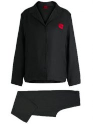HUGO Piżama Elle 50531526 Czarny Relaxed Fit. Czarne piżamy damskie Hugo, s, bez wzorów, z wiskozy, bez ramiączek. Za 279.99 zł.