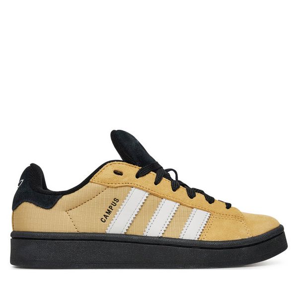 Sneakersy adidas. Żółte trampki i tenisówki chłopięce Adidas, bez wzorów, bez zapięcia. Za 259.99 zł.