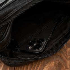 Paolo Peruzzi Saszetka męska do ręki skórzana dwukomorowa czarna T-131-BL. Czarne saszetki męskie Paolo Peruzzi. Za 186.65 zł.