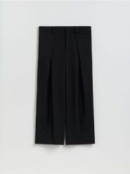 Spodnie loose fit - czarny. Czarne spodnie materiałowe męskie Reserved, l, bez wzorów, z tkaniny. Za 149.99 zł.