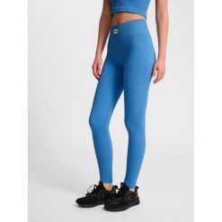 Damskie legginsy bezszwowe Hummel Pulse. Niebieskie legginsy damskie Hummel, bez wzorów, na fitness i siłownię. Za 163.50 zł.