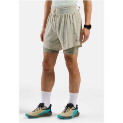 Spodenki męskie Odlo X-ALP TRAIL 6 INCH 2-in-1 short. Białe krótkie spodenki sportowe męskie Odlo, m, bez wzorów, trekkingowe. Za 399.99 zł.