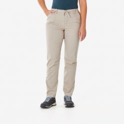 Spodnie turystyczne damskie Quechua NH500 Regular. Brązowe spodnie sportowe damskie QUECHUA, l, bez wzorów, z elastanu, trekkingowe. W wyprzedaży za 79.99 zł.