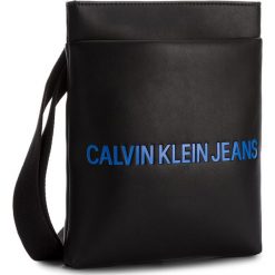 Saszetka CALVIN KLEIN JEANS - Smooth Flat Pack K40K400373 001. Czarne saszetki męskie Calvin Klein Jeans, z jeansu, młodzieżowe. Za 349.00 zł.