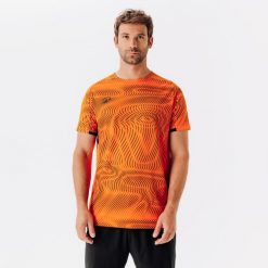 Koszulka piłkarska Kipsta Club Wavy. Brązowe koszulki sportowe męskie KIPSTA, l, bez wzorów, z materiału, bez kołnierzyka, bez ramiączek, do piłki nożnej. Za 59.99 zł.