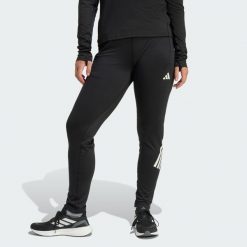 Spodnie adi365 Iconic Running. Czarne obuwie sportowe damskie Adidas, bez wzorów, do biegania. Za 279.00 zł.