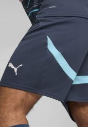 Męskie szorty RB Leipzig PUMA Dark Night Hero Blue. Niebieskie szorty męskie Puma, na jesień, l, bez wzorów, z materiału, klasyczne. Za 191.20 zł.