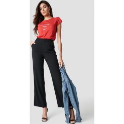 Hannalicious x NA-KD Spodnie garniturowe z wysokim stanem - Black. Spodnie materiałowe damskie marki Hannalicious x NA-KD. Za 161.95 zł.