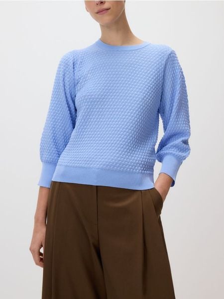 Sweter z bufiastym rękawem - jasnoniebieski. Niebieskie swetry damskie Reserved, l, bez wzorów, z dzianiny, bez kołnierzyka, bez ramiączek, bez kaptura. W wyprzedaży za 55.99 zł.