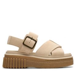 Sandały Clarks. Brązowe sandały damskie Clarks, bez wzorów, bez obcasa, na koturnie, bez zapięcia. Za 379.99 zł.