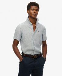 Superdry Haftowana lniana koszula Vacation – Navy Ticking Linen. Niebieskie koszule męskie Superdry., na lato, l, bez wzorów, ze lnu, klasyczne, bez kołnierzyka, bez ramiączek. Za 287.50 zł.