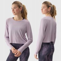 LONGSLEEVE DAMSKI 4F CROP-TOP DO JOG BLUZA Z DODATKIEM MODALU KOLOR FIOLETOWY. Fioletowe bluzy damskie 4f, l, bez wzorów, z materiału, bez kaptura. Za 79.99 zł.