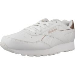 Tenisówki Reebok Model Rewind Run Kolor Biały. Białe trampki i tenisówki damskie Reebok, bez wzorów, z materiału, bez zapięcia. Za 195.30 zł.
