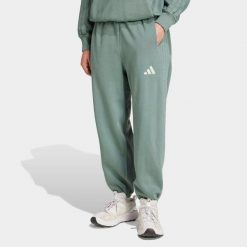 Spodnie polarowe z efektem sprania ADIDAS ALL SZN. Zielone spodnie materiałowe męskie Adidas, m, bez wzorów, z bawełny, eleganckie. Za 289.99 zł.