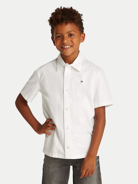 Tommy Hilfiger Koszula KB0KB09554 S Biały Regular Fit. Białe koszule dla chłopców Tommy Hilfiger, bez wzorów, z bawełny, bez kołnierzyka, bez ramiączek. Za 135.99 zł.